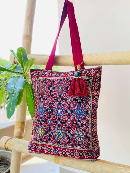 Ajrakh Handbag With Embroidery Mirror Work In Pink Colour