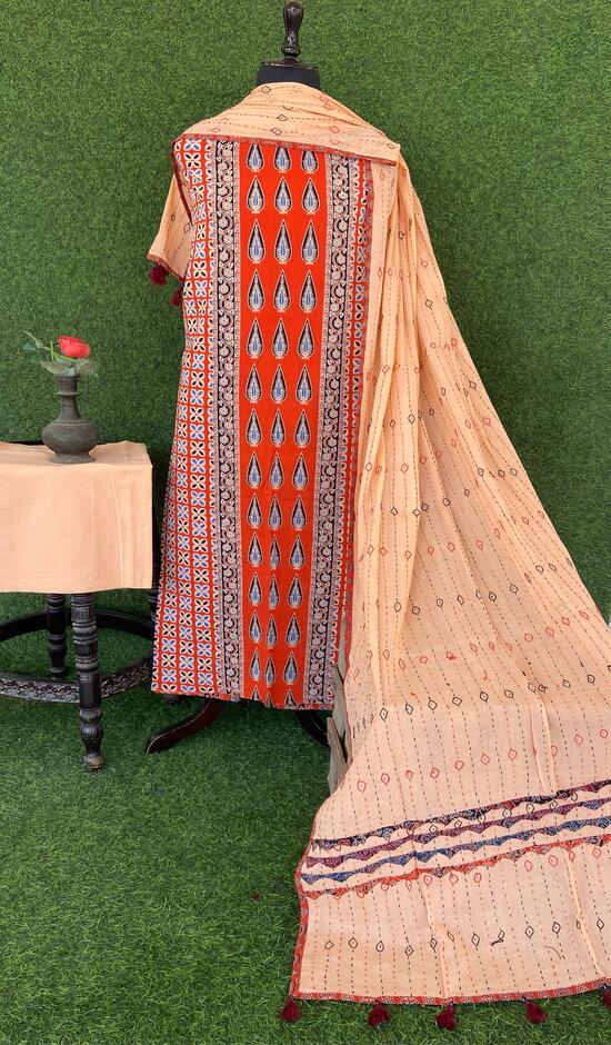 Orange Ajrakh print panel Suit pcs with Beige kantha work mul dupatta