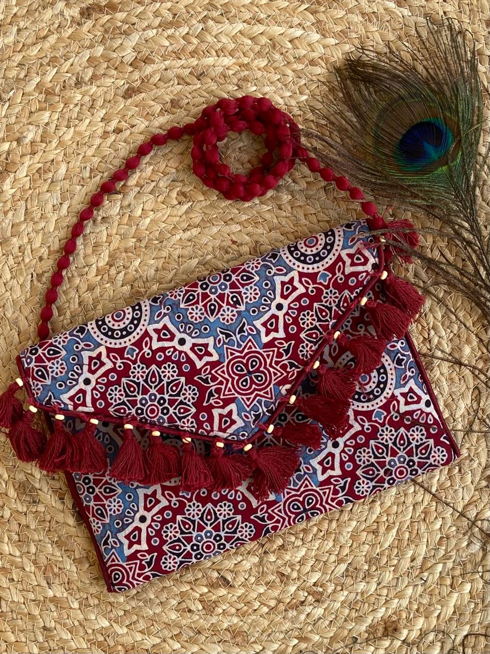 Ajrakh printed clutch cum sling bag