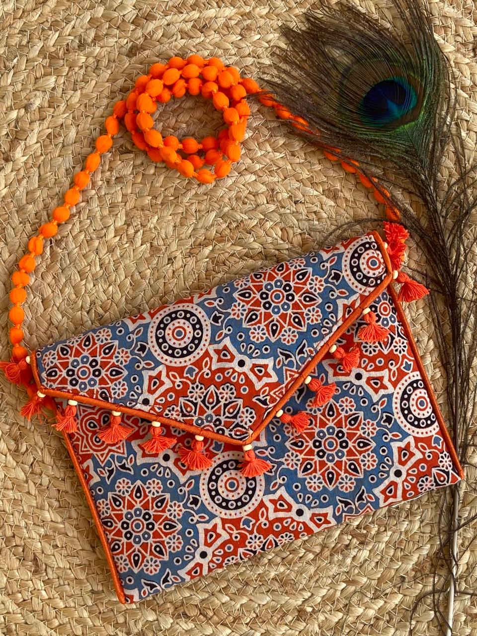 Ajrakh printed clutch cum sling bag